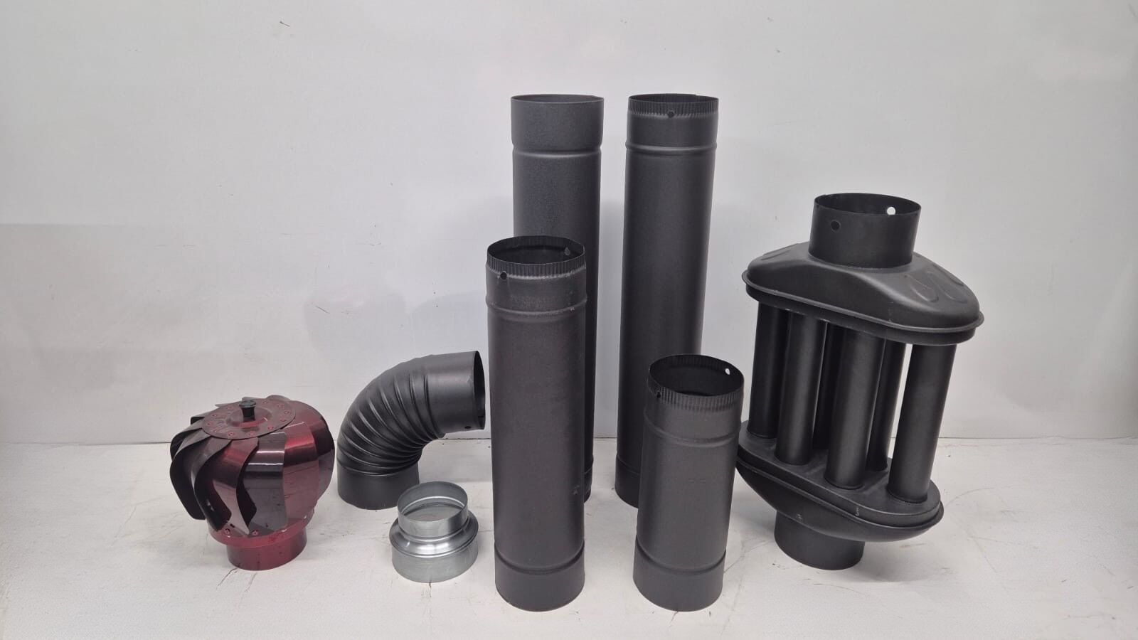 1 adet fırıldak 1 adet dırsek 1 adet Cimri 1 adet 50 cm boru 1 adet 33 boru 2 adet 70 cm boru 1 adet 10’’ → 13’’ dönüştürücü aparat